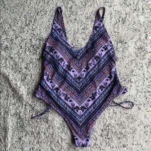 Kendall’s and Kylie purple one piece
